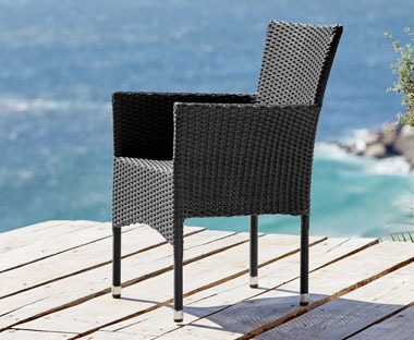 Polyrattan stacking chair in black