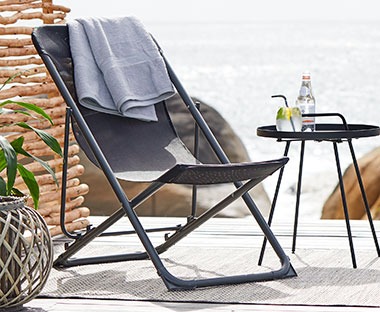 Camping chair available in grey, red and green