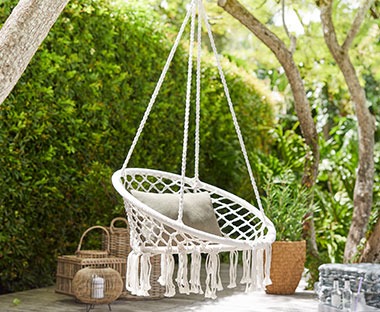 White hanging swing chair in white