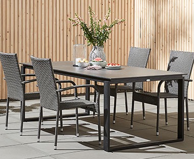 Grey table with 4 grey chairs for garden