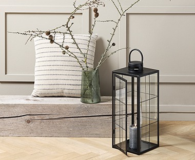 Metal and glass lantern in black