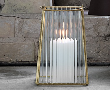 Glass and metal lantern for home decoration in brass