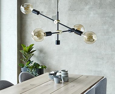 Metal pendant light in Black and Brass