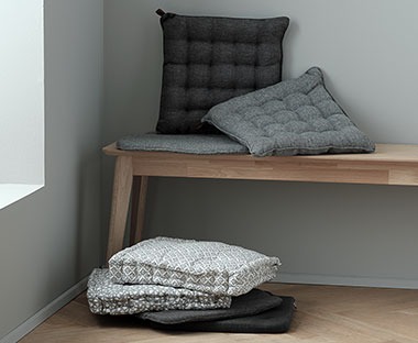 Several soft cushions available in wintery colours