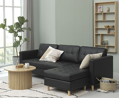3-seater faux leather sofa with chaise longue in black with wood legs