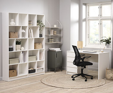 Office room with furniture including office chair, desk, shelf and bookshelf