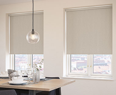 Trimmable spring loaded roller blind in beige colour