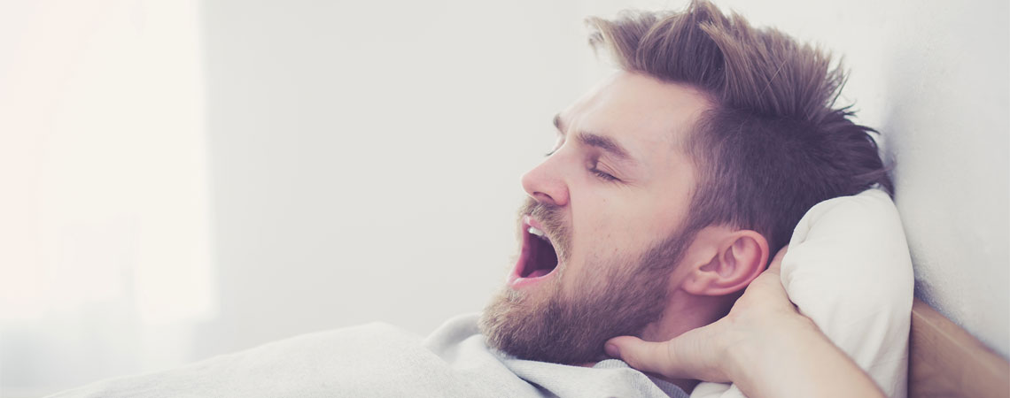 what causes a person to yawn?