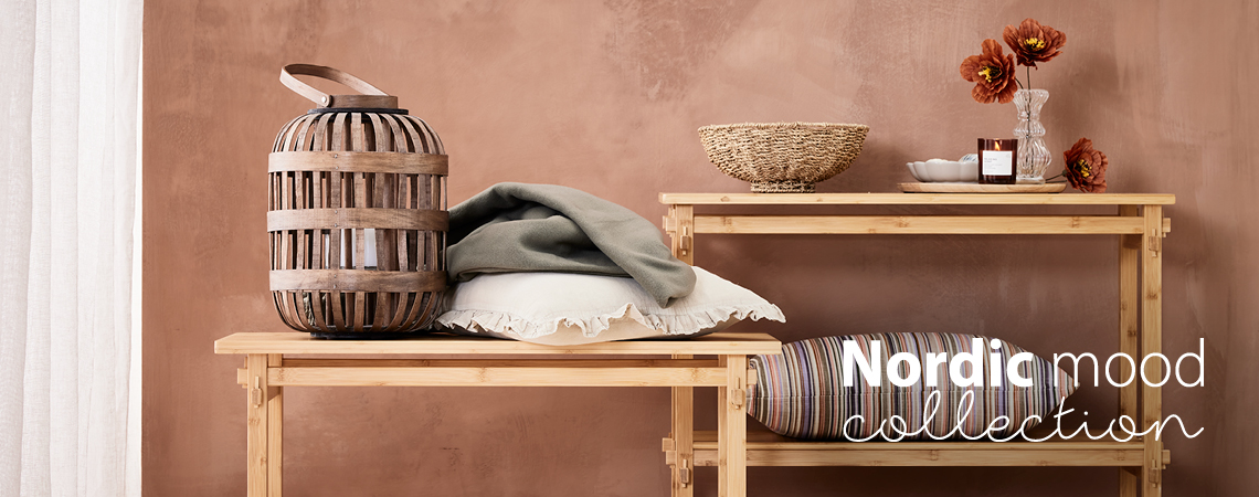 Cushions, throw, lantern, and home décor in rustic and romantic design 
