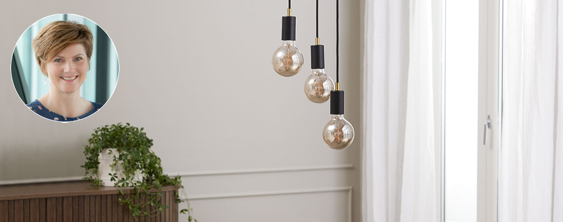 Black pendant light with large light bulbs and insert of Tina Nymann