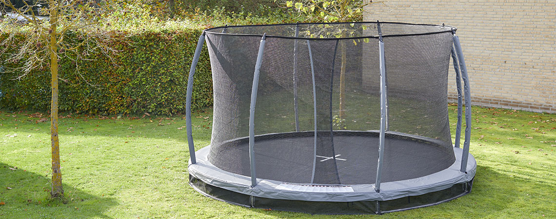 In-ground garden trampoline on a lawn