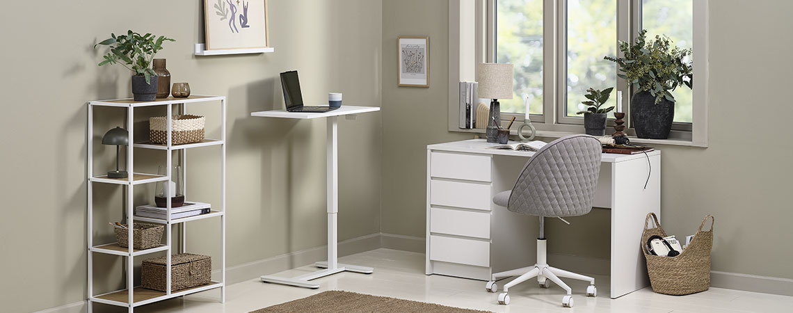 Home office with height-adjustable desk, office chair, desk and bookcase