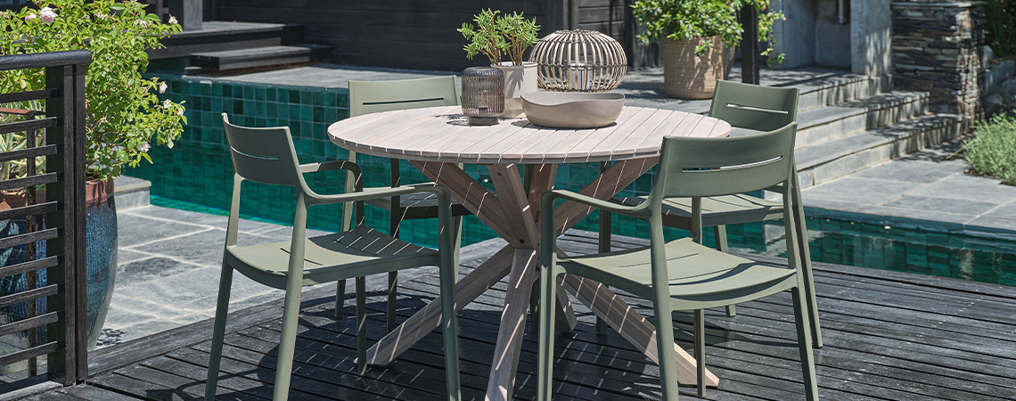 A hardwood garden table is a popular garden trend for ultimate outdoor living