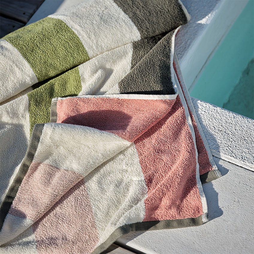 BACKA beach towel in multiple colours Striped beach towel in red, white, grey, pink, and salmon colour