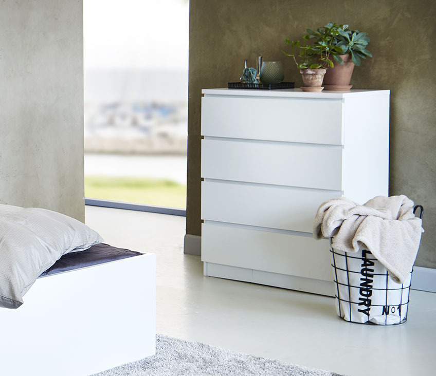 Large chest of drawers in a bedroom