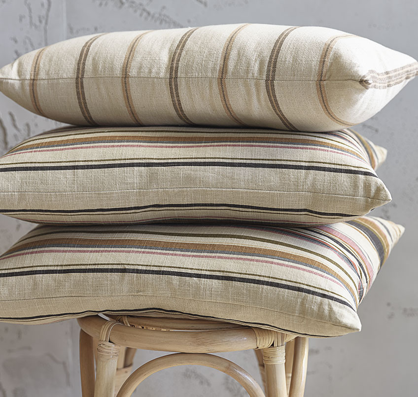 BERGMYNTE and ENGKLOKKE cushions in beige with stripes in mellow colours Beige cushions with striped patterns in various mellow colours