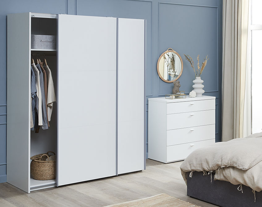 White chest of drawers in bedroom