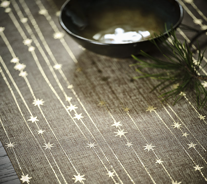 Table runner with golden pattern