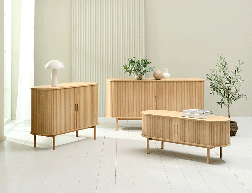 Room with two different sizes of sideboards and a TV bench in natural oak