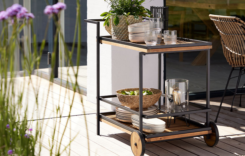 Garden lounge trolley made with solid acacia on patio 