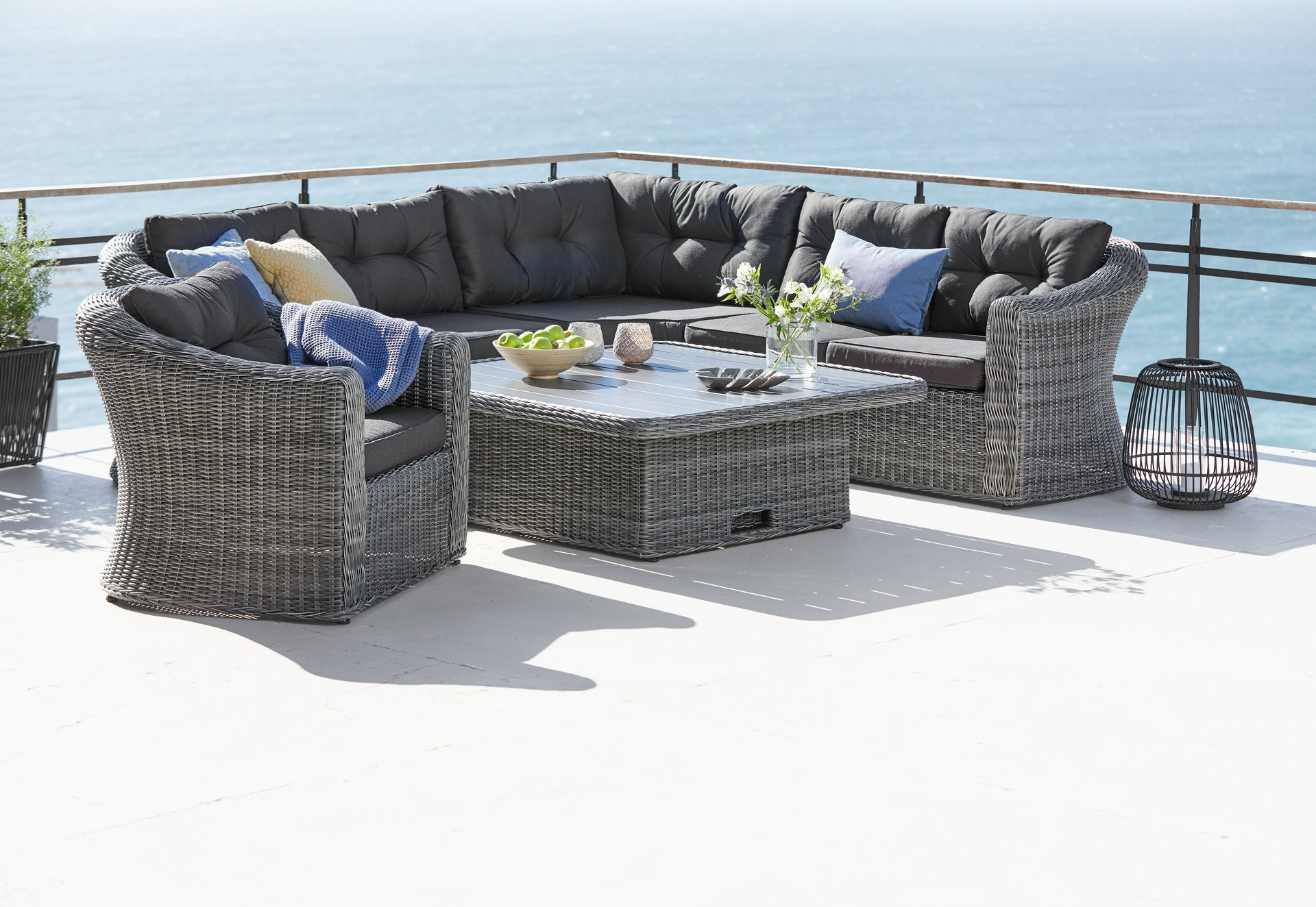 Grey garden lounge set with corner sofa, chair and adjustable table