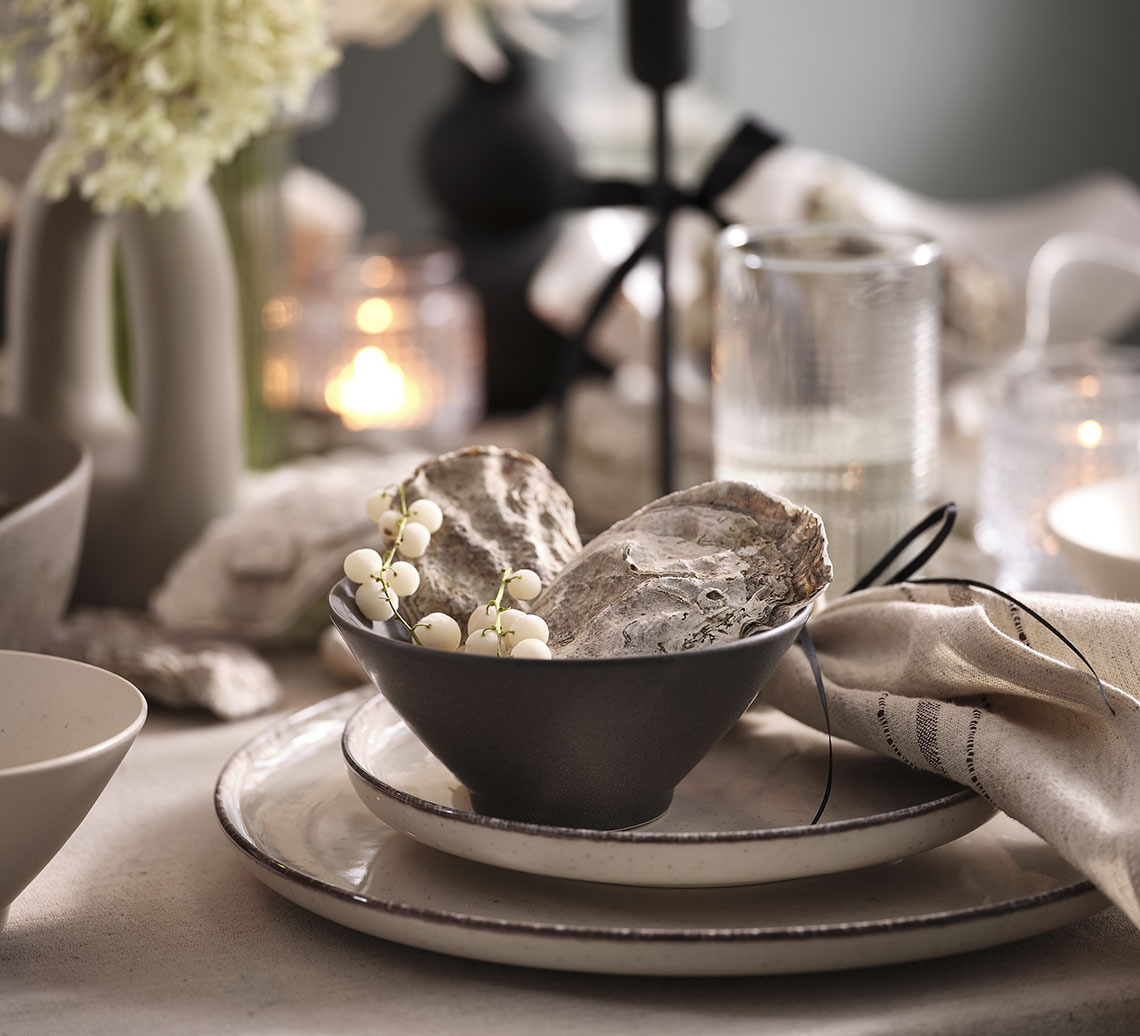 Place setting with dinner plate, lunch plate and bowl 