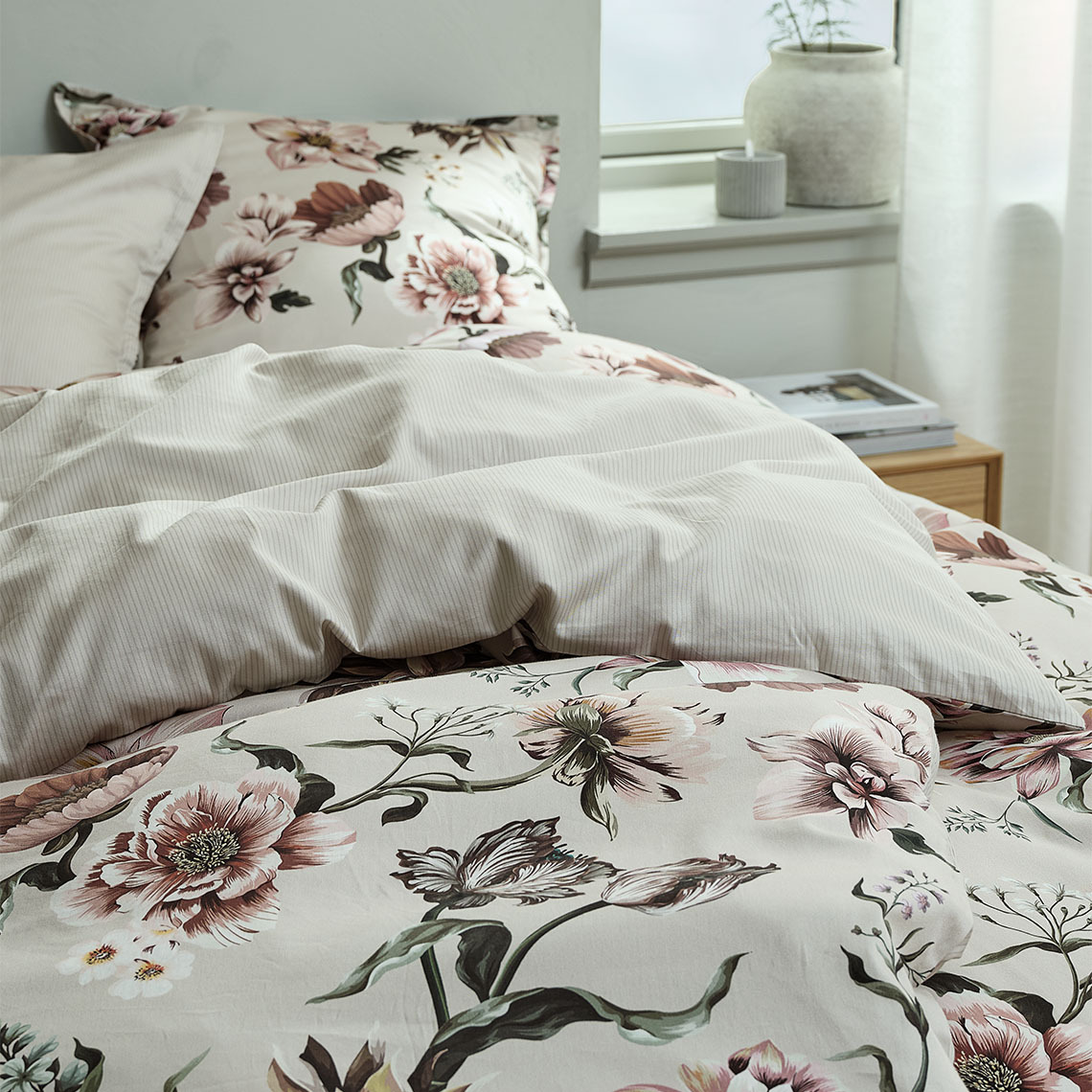 Light beige duvet cover set and cotton bedding with floral design