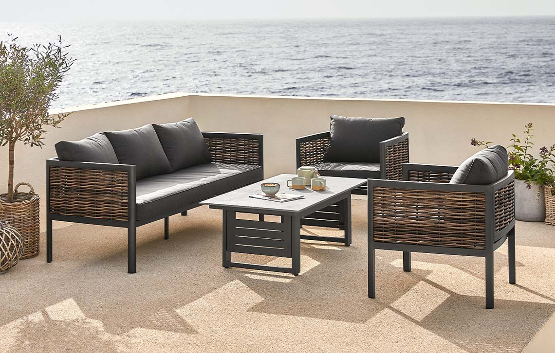 Garden lounge set with table top made with fibre cement and quick-dry cushions