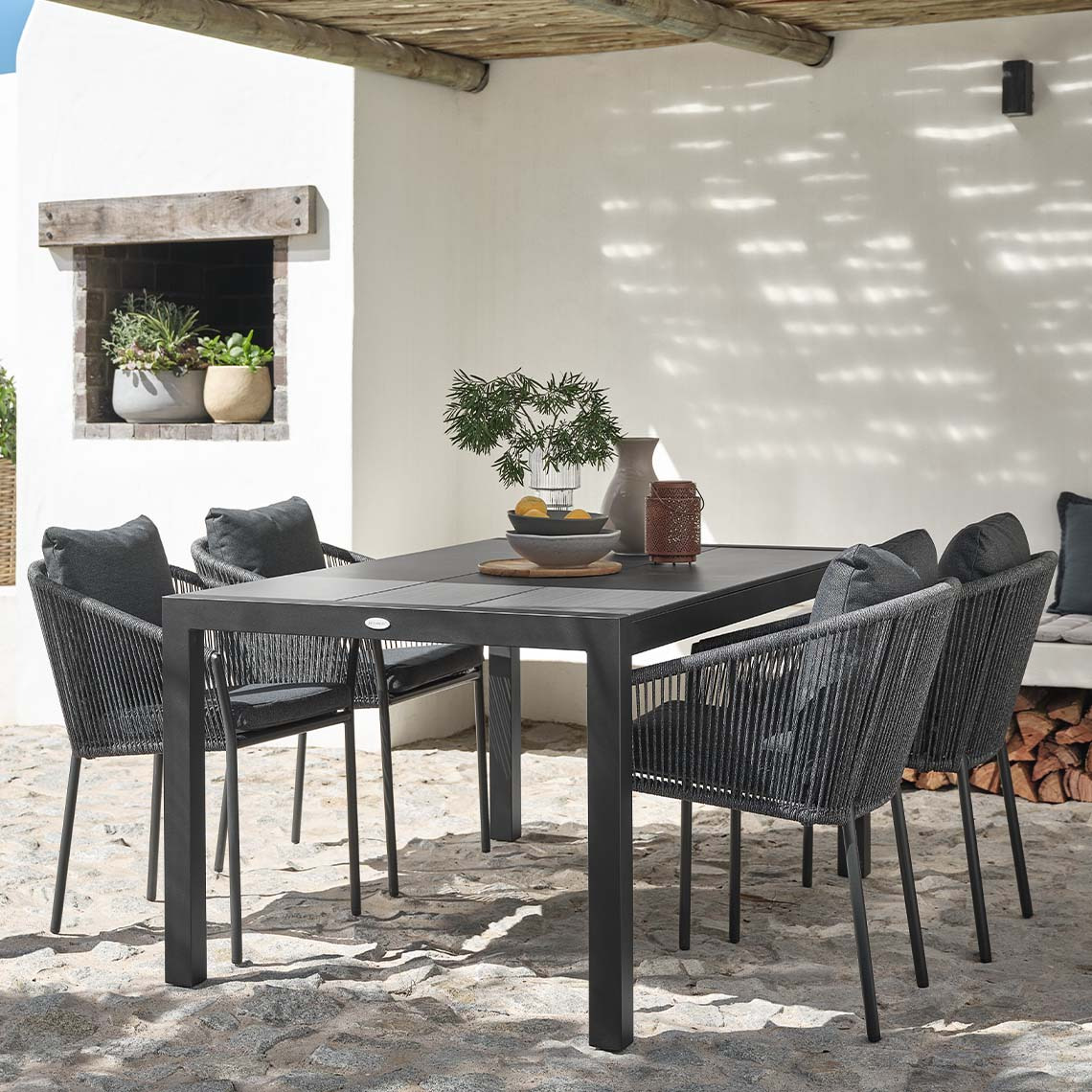 Garden table and four garden chairs with quick-dry cushions on patio patio 