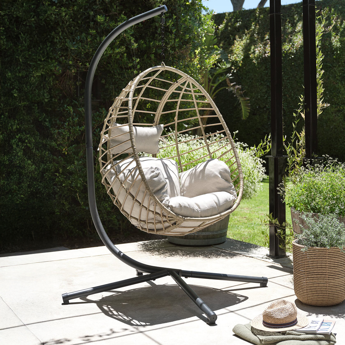 Outdoor hanging chair on patio