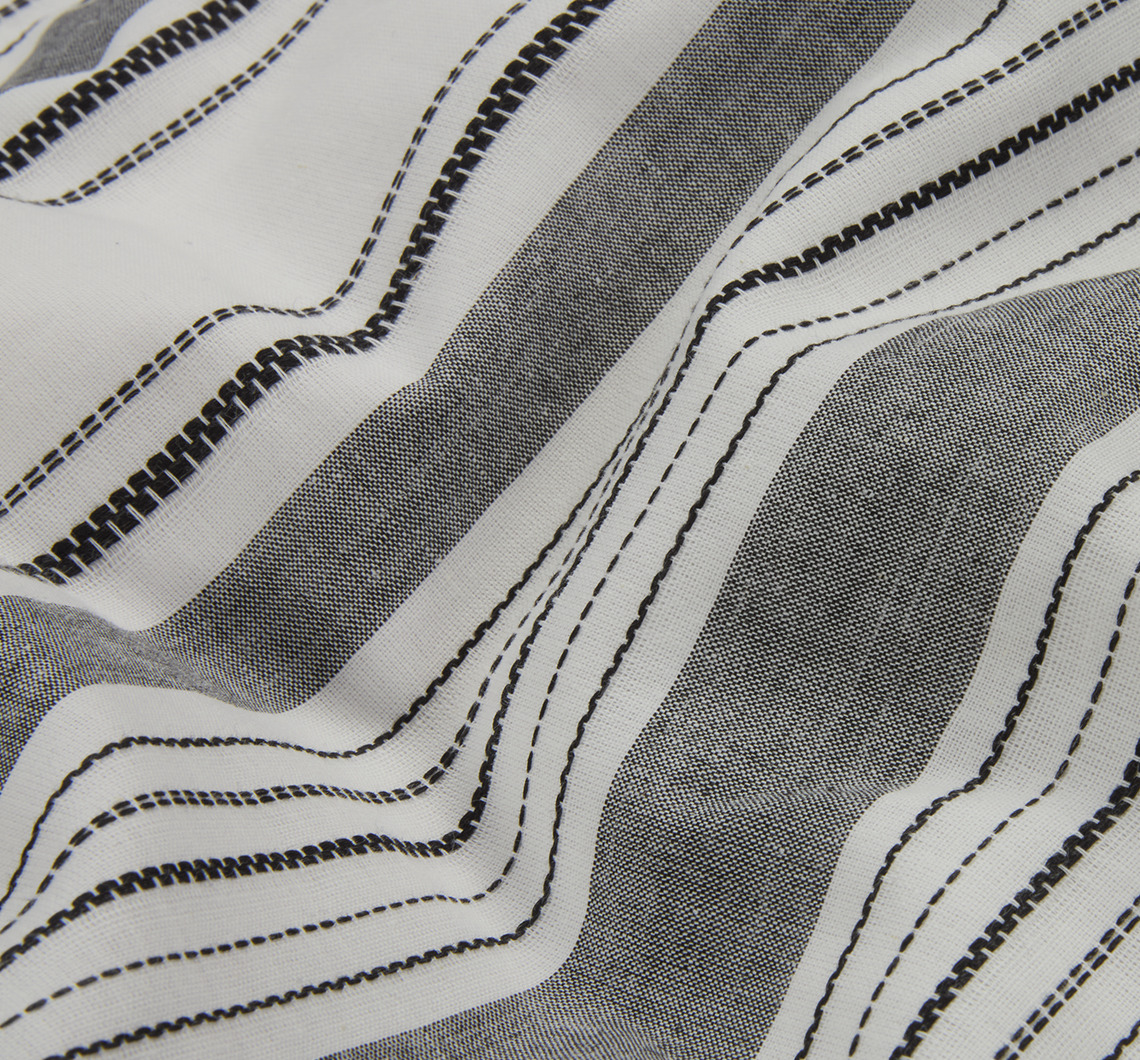 IDA bed linen is striped in black, white and anthracite Closeup of striped duvet cover set
