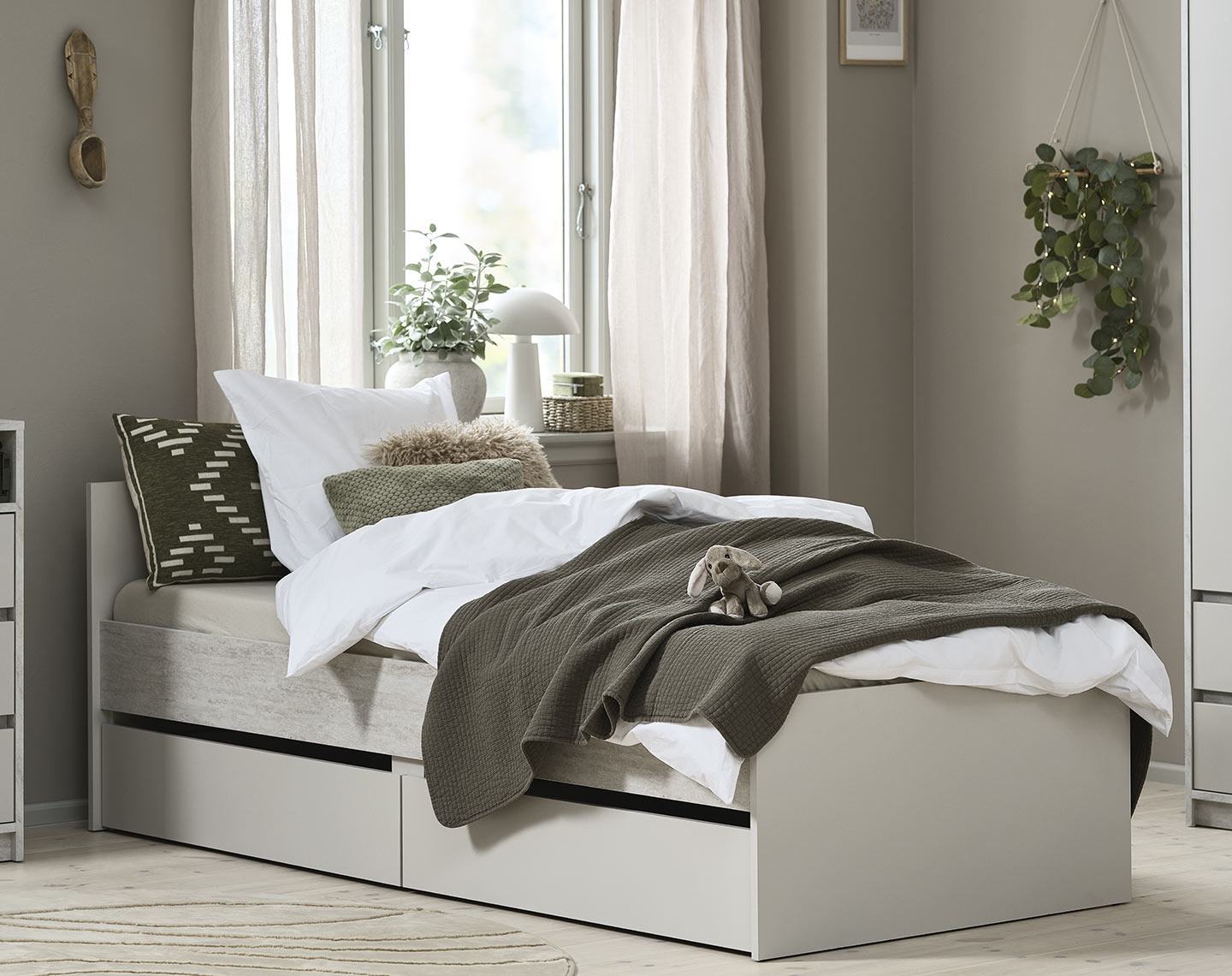 Bed frame with storage in a bedroom 