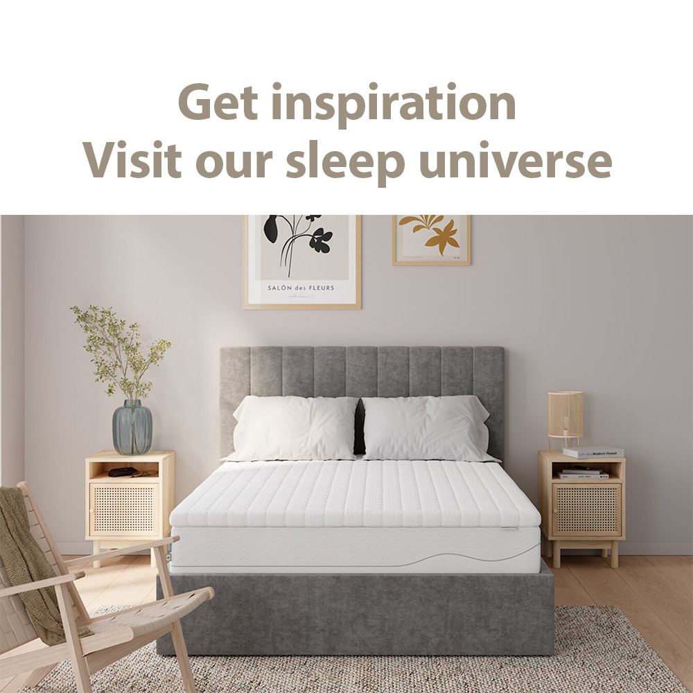 Mattress and bed frame in bedroom