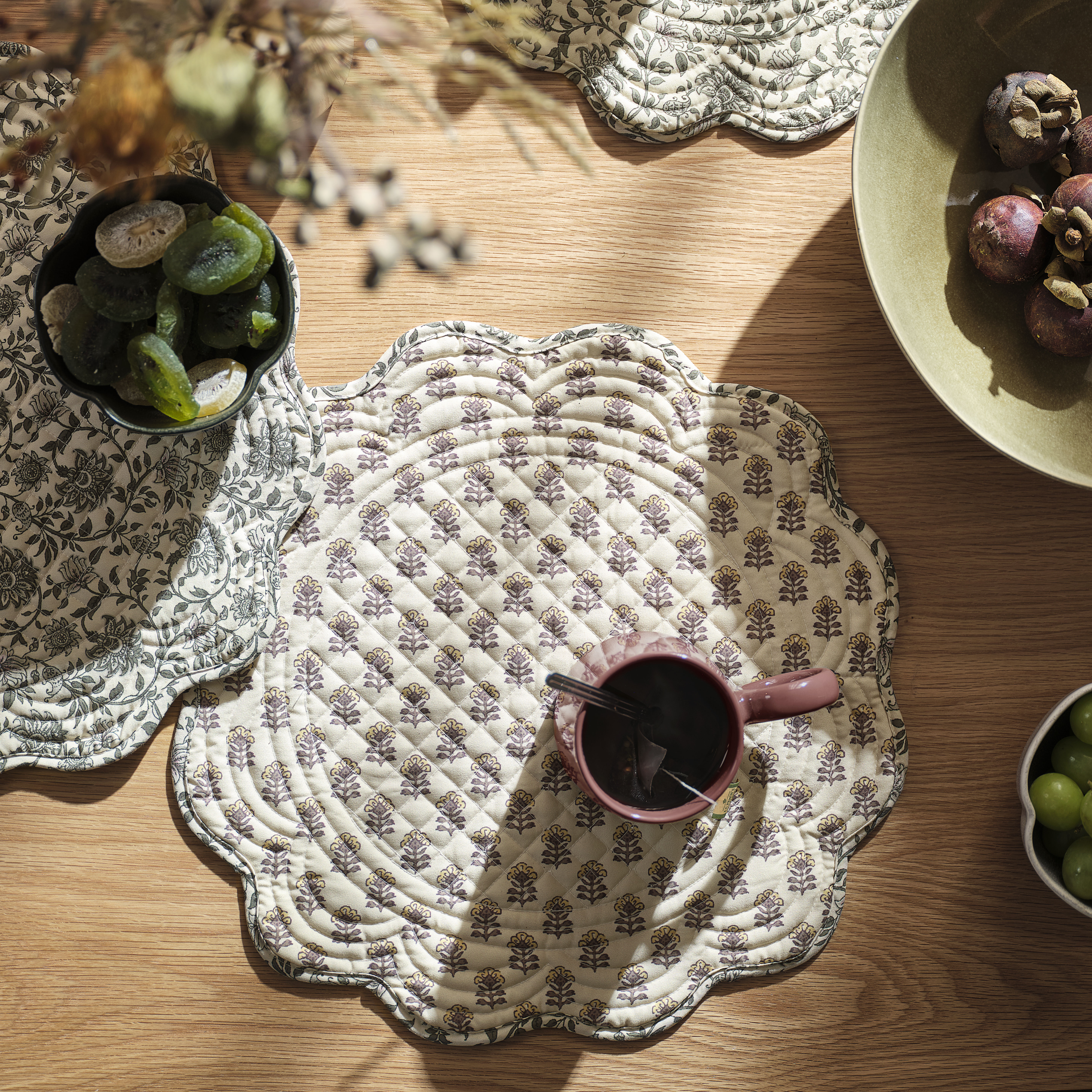 Dining table with bowls, mug and placemats