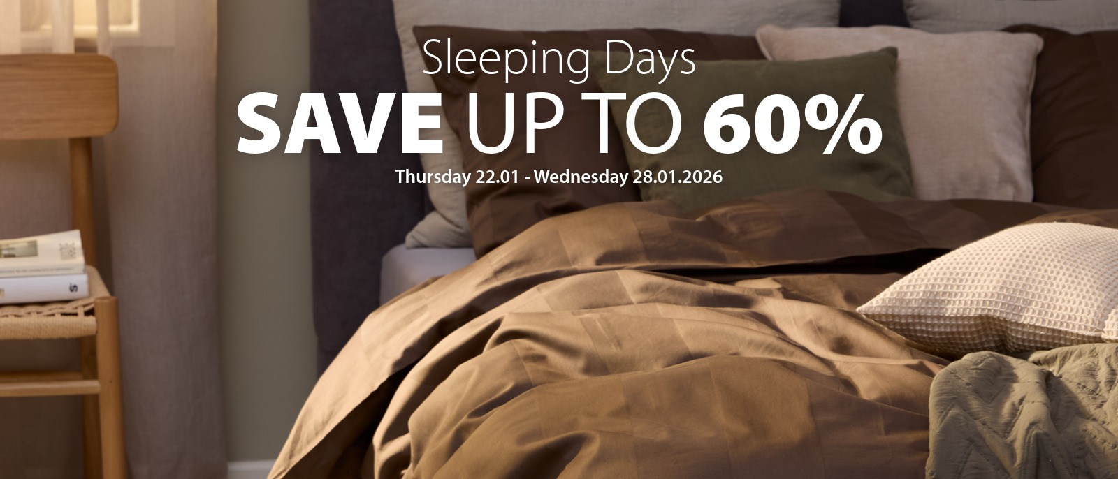 Brown duvet cover on bed with pillows