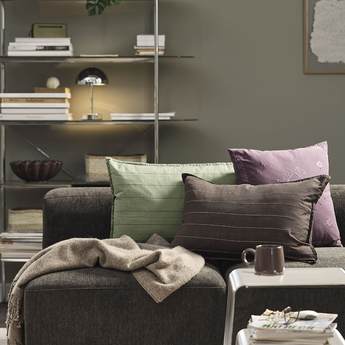 REINFANN throw, NATTLILJA cushion, POPPEL striped cushion covers, NOR bowl and KENT battery lamp Sofa with cushions and throw
