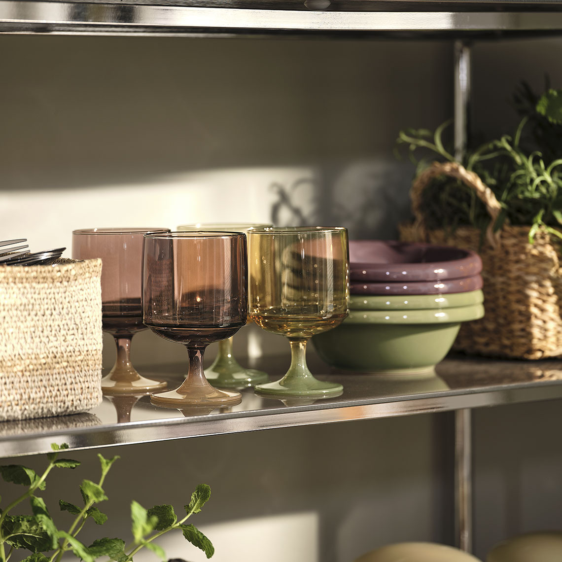 ISAK drinking glasses and MALIK bowls Colourful glasses and bowls on a shelf