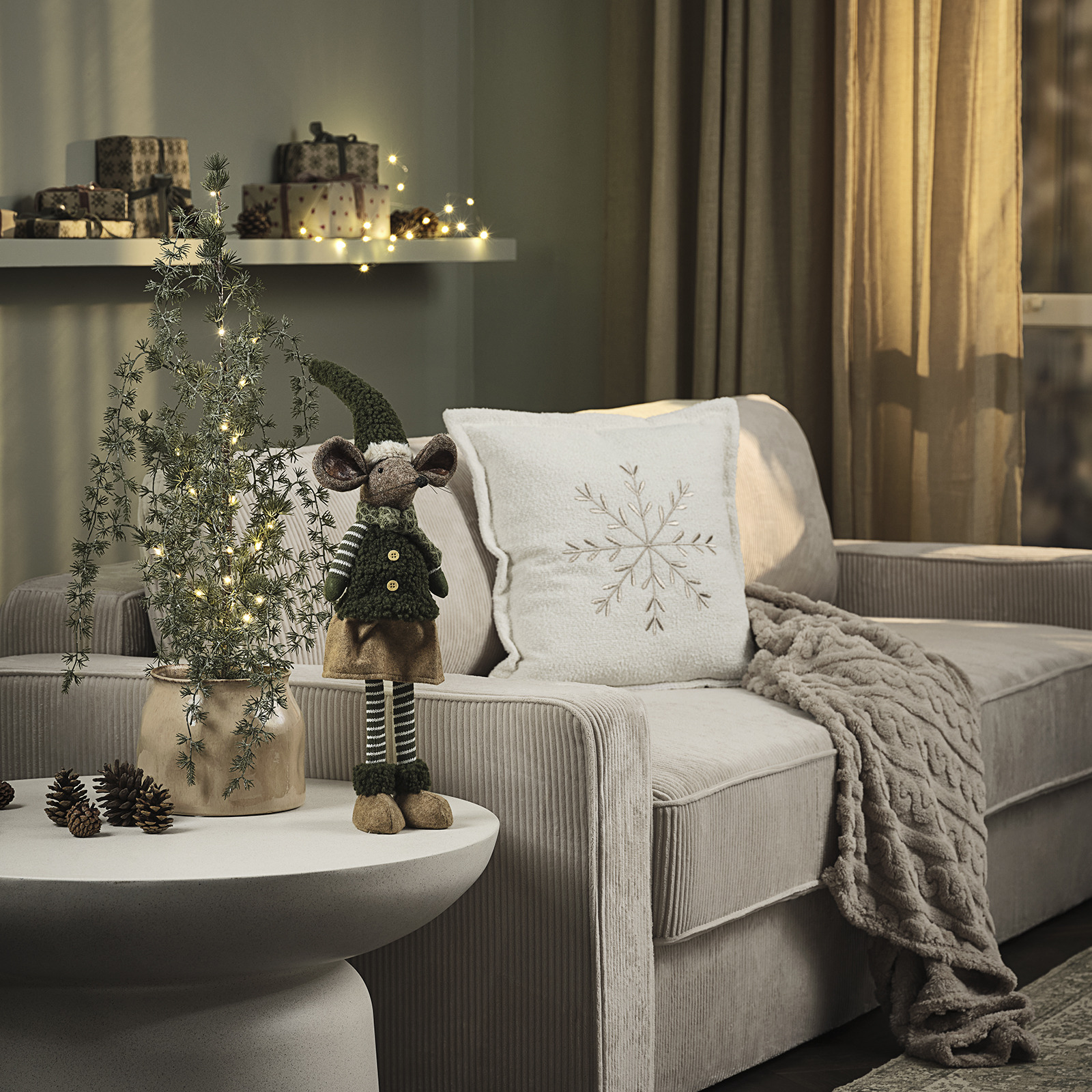 Side table with Christmas mouse and artificial Christmas tree