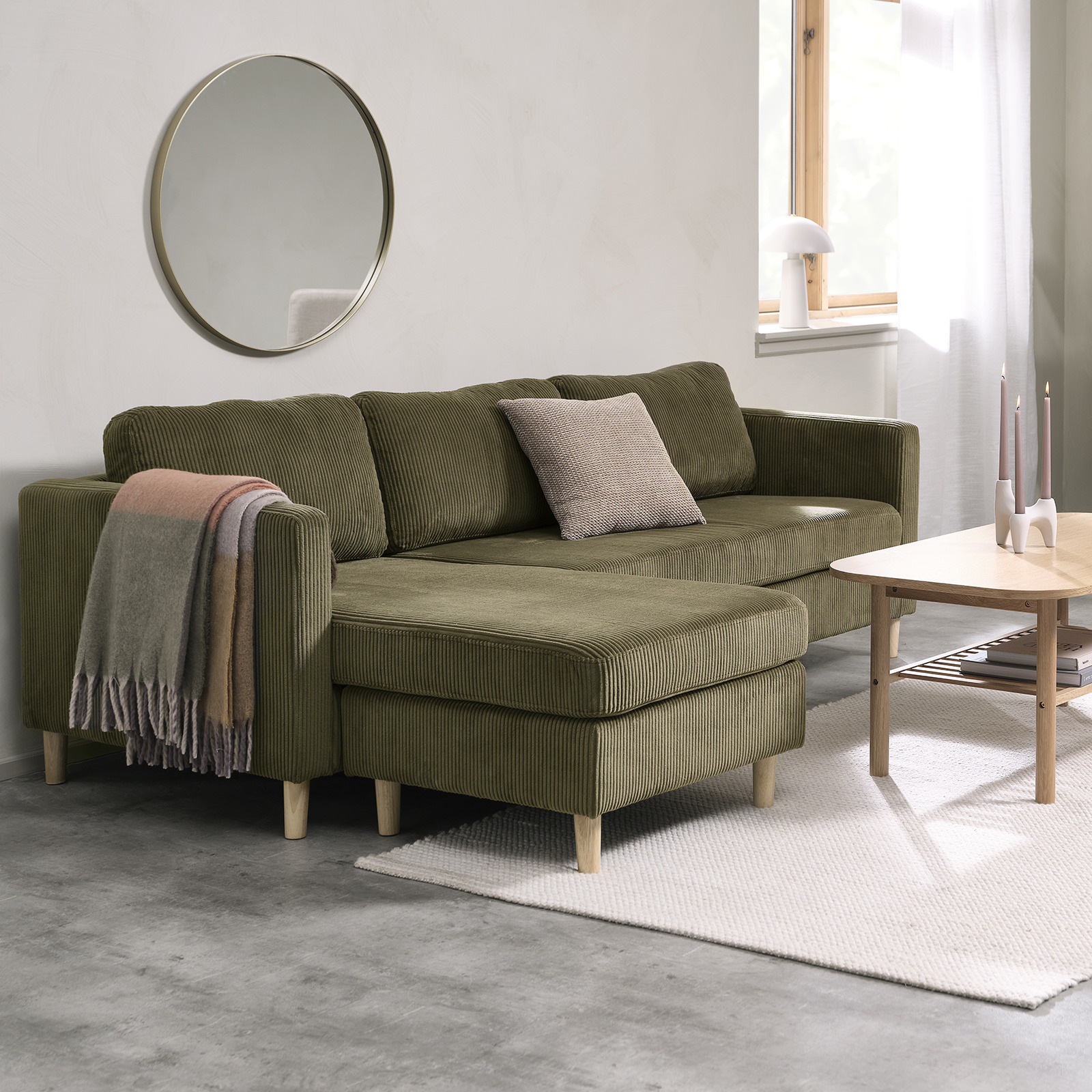 Olive green sofa with chaise longue