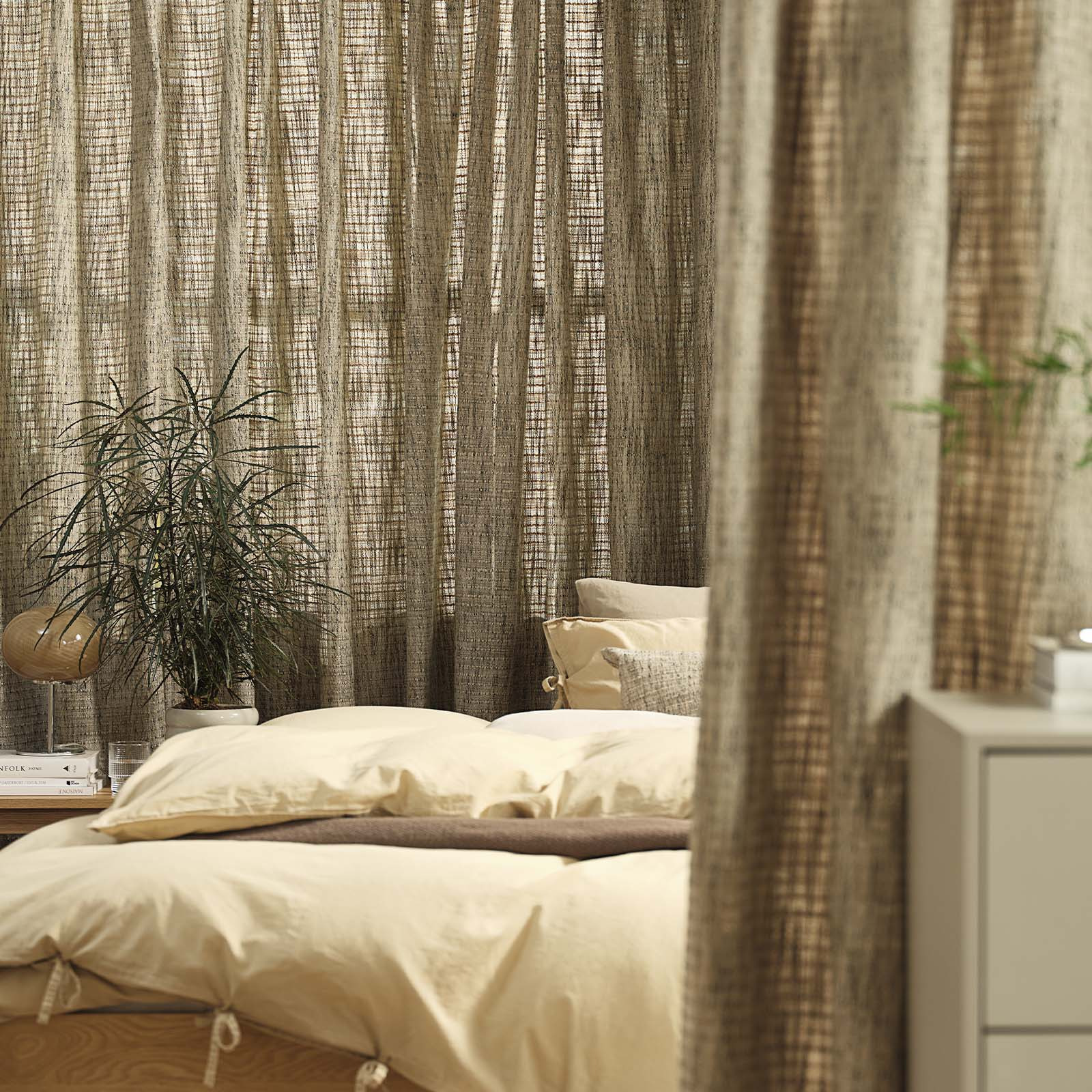 HAREIDLANDET curtain in sandy green Window covered by a sandy green heavy curtain in bedroom