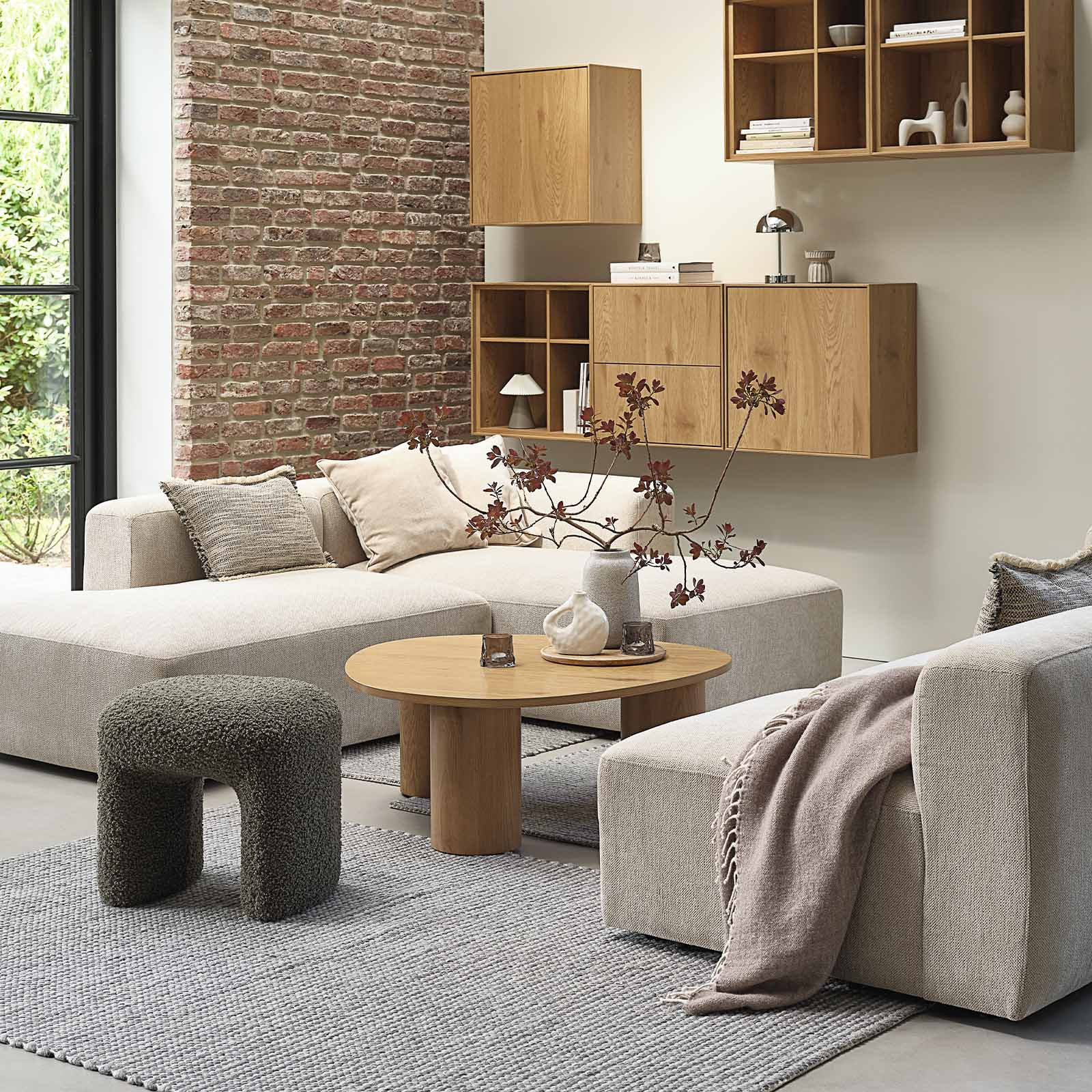 Beige modular corner sofa with open ends in living room