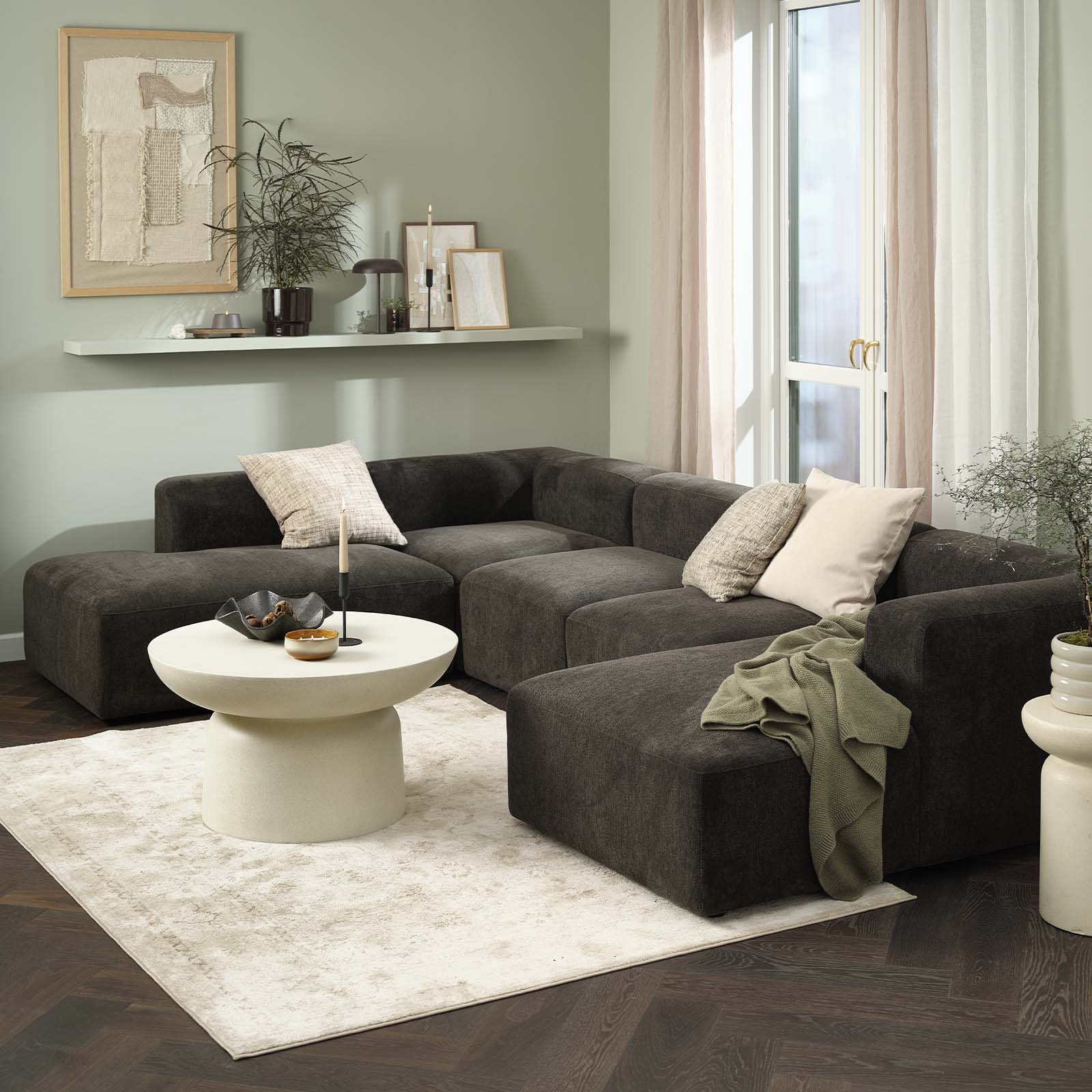 Dark brown modular corner sofa with two corners and open ends in living room