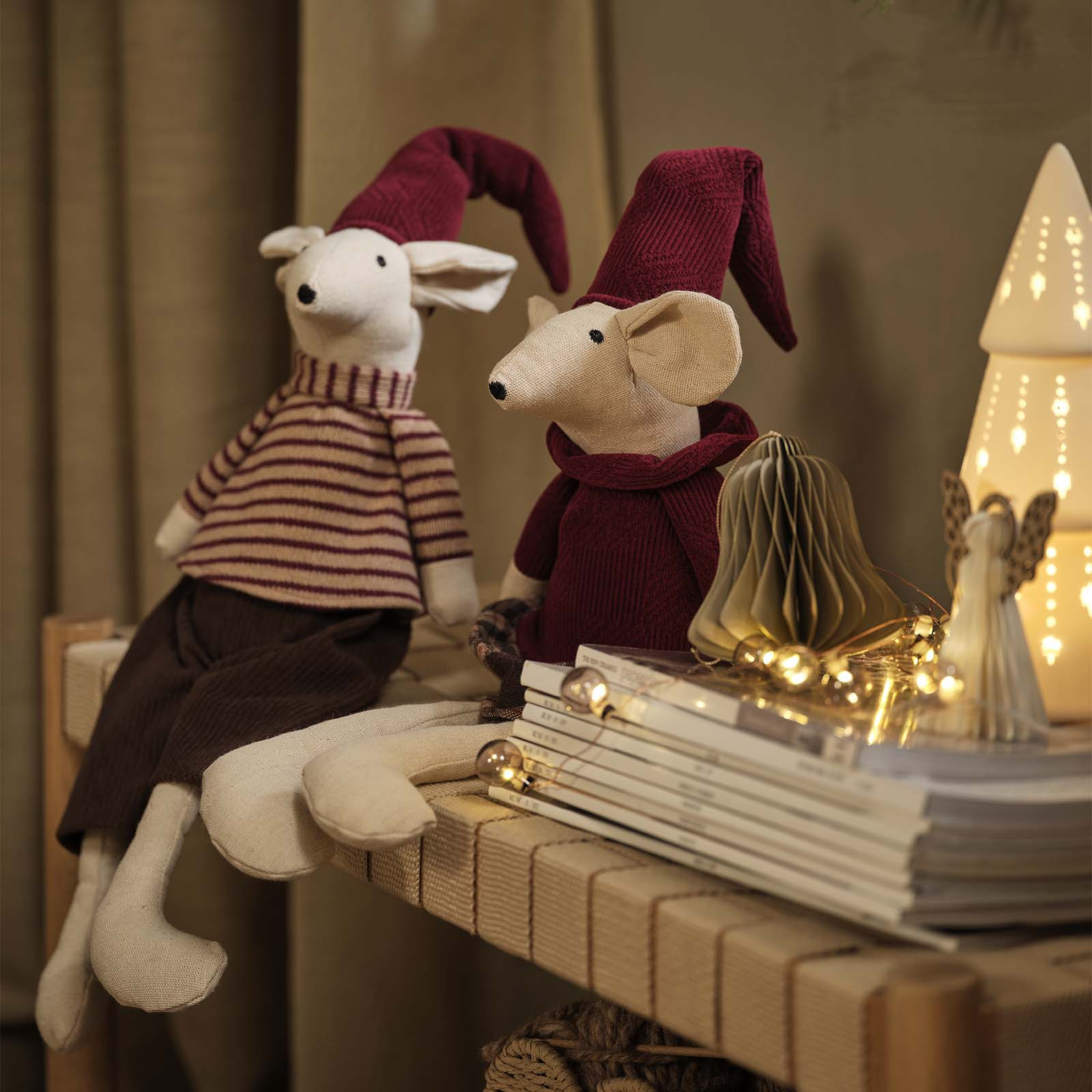 JULKLAPP Christmas mice Decorative Christmas mice with pointy Christmas hats in burgundy on a daybed