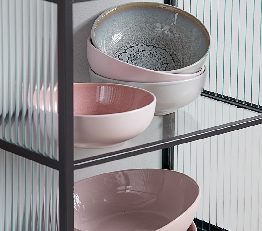 Natural ceramics in rose and light blue on glass ROAR shelf Bright coloured bowls on glass shelf