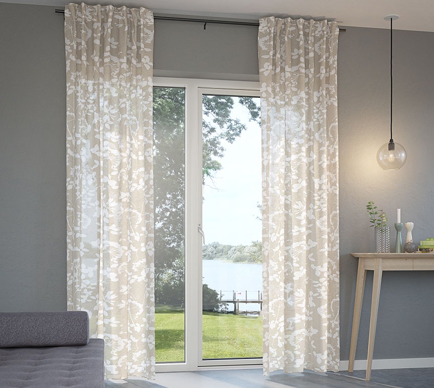 Lightweight BOLMEN curtains Lightweight curtains in front of a patio door