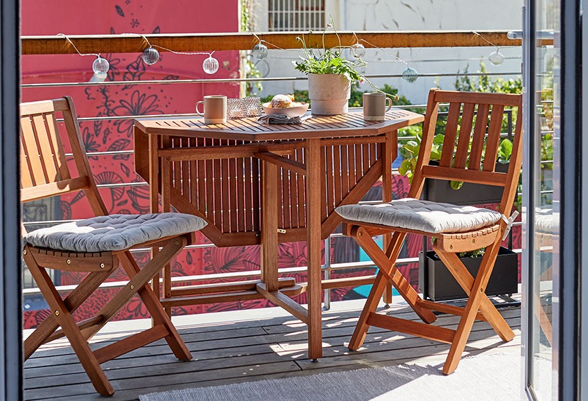 Small wooden outdoor table and outlet chairs