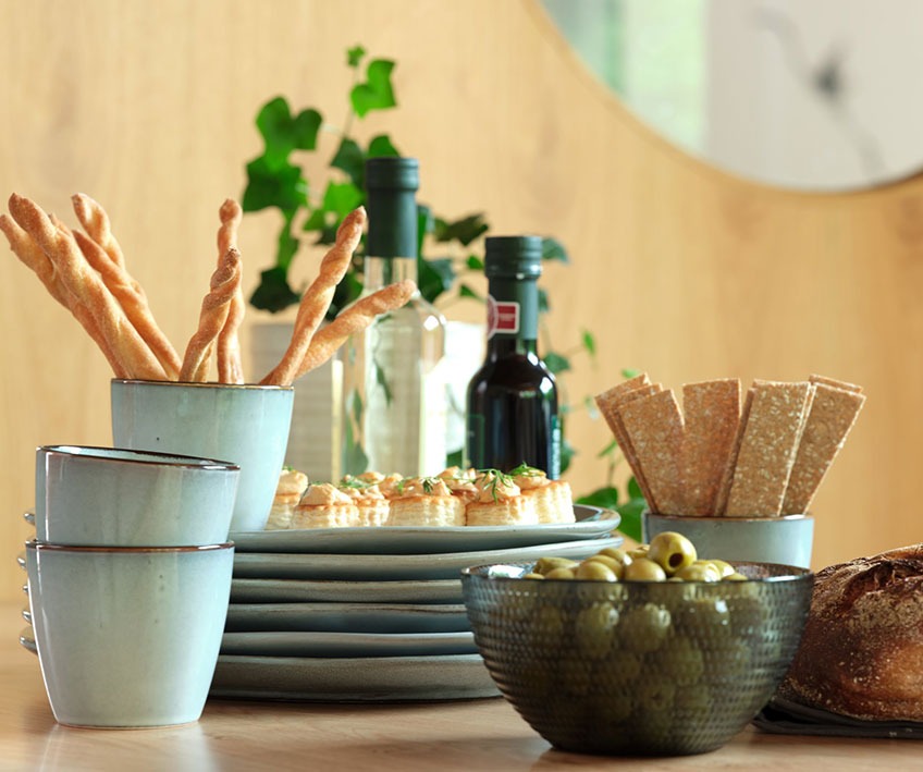 Stoneware mugs and plates and glass bowl