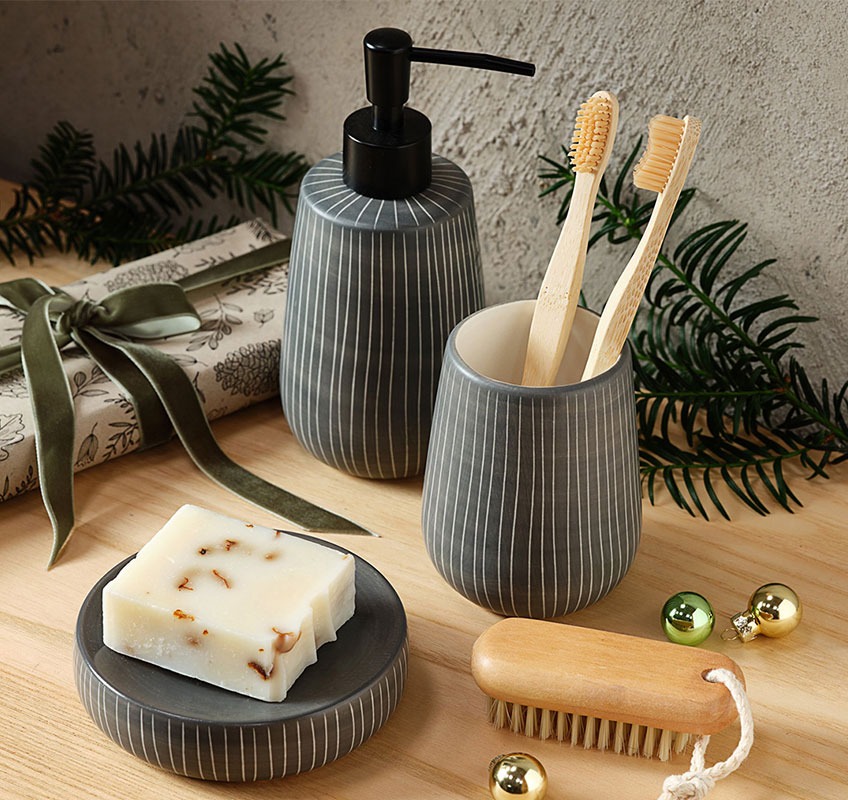 Grey soap dish, toothbrush holder and soap dispenser with white stripes