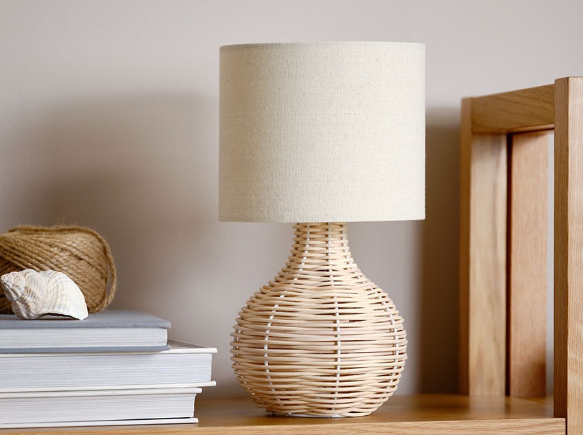 Rattan table lamp with a light lamp shade 
