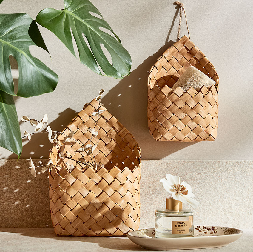 Hanging wicker baskets and scented oil 